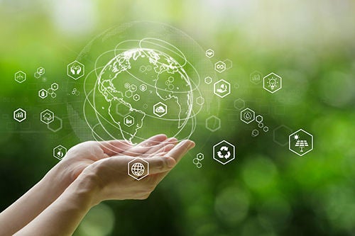 Sustainable development goal (SDGs) concept. Hands holding Global communication network with Environment icon on a green background. Green technology and Environmental technology.